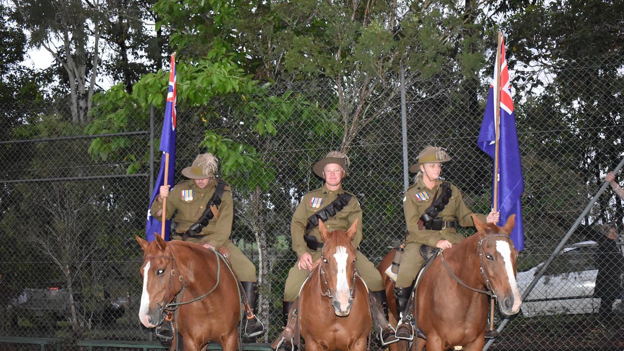 Ben Burston, John McGill, Ellise Burston at the Kuttabul dawn service at the Hampden State School Remembrance Garden 2021. Picture: Lillian Watkins