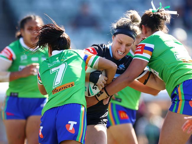 Holli Wheeler of the Sharks hits the ball up. Picture: Getty Images