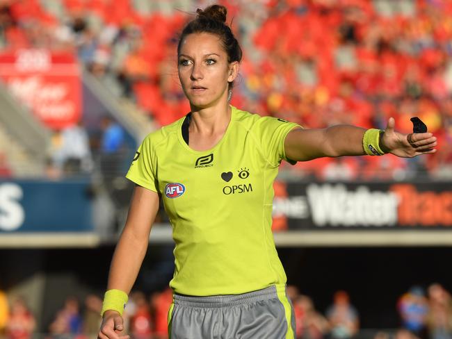 Umpire Eleni Glouftsis during the Round 11 AFL match between the Gold Coast Suns and the West Coast Eagles at Metricon Stadium in Carrara on the Gold Coast, Saturday, June 3, 2017. (AAP Image/Dave Hunt) NO ARCHIVING, EDITORIAL USE ONLY