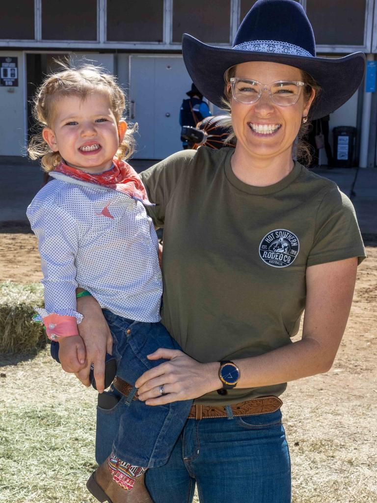 Taite, 2, and RahniCotterill at Mount Isa Mines Rodeo. Picture: Peter Wallis