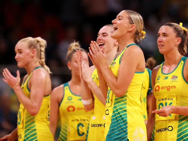 SYDNEY, AUSTRALIA - OCTOBER 30: The Australian players cheer as Amy Parmenter of Australia is presented the player of the match award during game two of the International Test series between the Australia Diamonds and the England Roses at Qudos Bank Arena on October 30, 2022 in Sydney, Australia. (Photo by Mark Kolbe/Getty Images for Netball Australia)