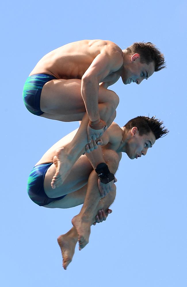 Domonic Bedggood and Declan Stacey of Australia during the Mens 10m Syncro Final at the XXI Commonwealth Games at the Gold Coast Aquatic Centre on the Gold Coast. Picture: AAP Image/Dave Hunt