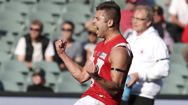 Robbie Young celebrates a goal as the Roosters go on a rampage in the third term. Picture Sarah Reed