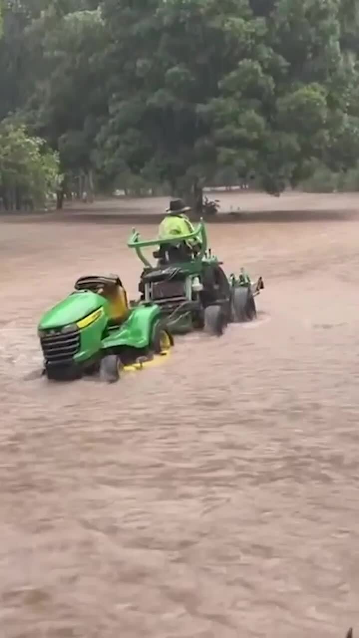 Man rescuing his one true love from raging floods
