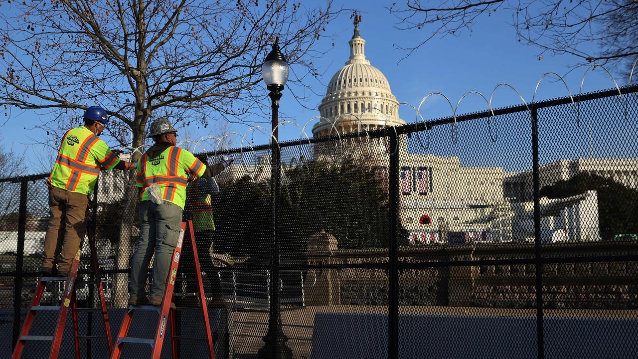 Razor wire goes up around the Capitol the day after the House of Representatives voted to impeach President Donald Trump for the second time. Picture: Chip Somodevilla/Getty Images/AFP