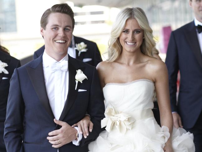 Oliver Curtis, pictured marrying Jacenko in 2012, has left behind his luxury lifestyle for a cell and jail;-issue doona in freezing Cooma prison. Picture: News Corp