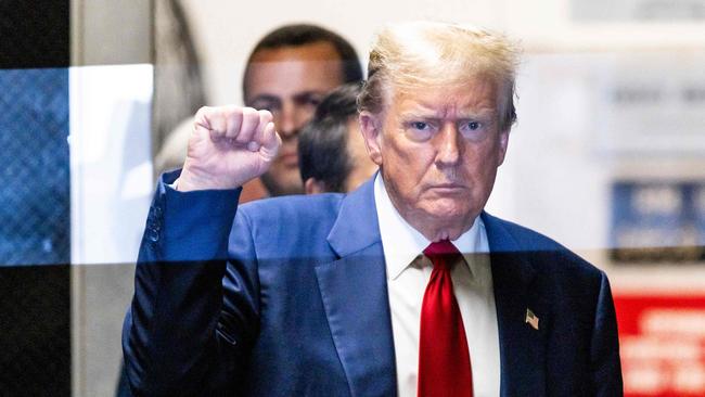 Donald Trump gestures as he walks back to the courtroom after a break in his trial for allegedly covering up hush money payments. Picture: AFP