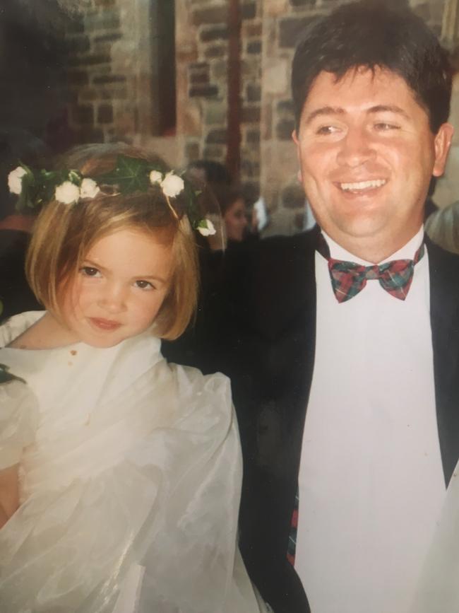 Olivia as a young girl with dad Mark.