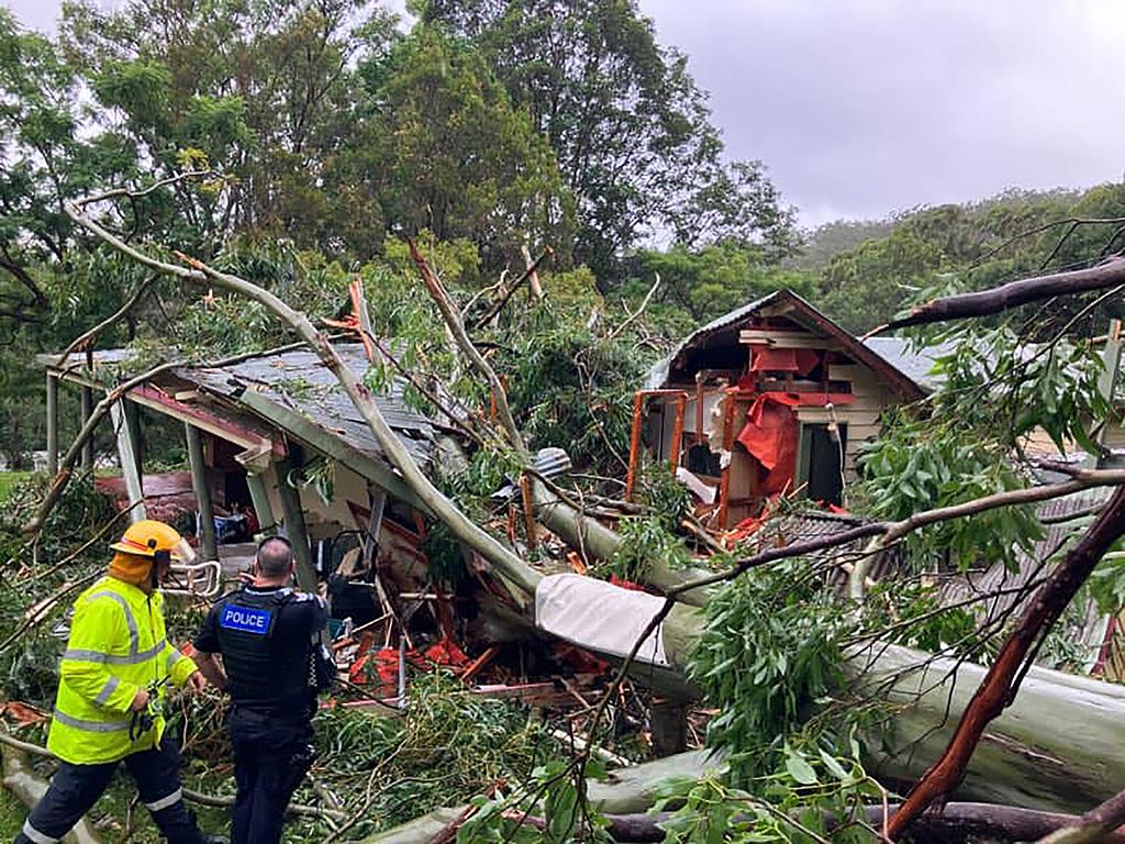 A large gum tree crashed into a Currumbin Valley home on Friday. Picture: Queensland Ambulance Service/Facebook