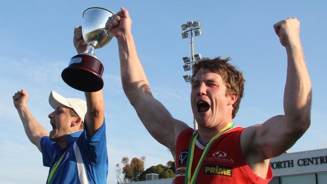 Mark Alvey (left) and captain Phil Byrnes celebrate success with Wentworth in 2012. Pictured: Supplied.