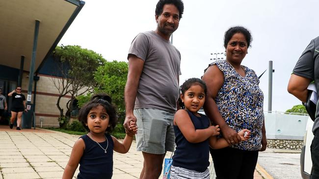 Nades and his wife Priya and their daughters Tharunicaa and Kopika on Christmas Island. Picture: Colin Murty/The Australian