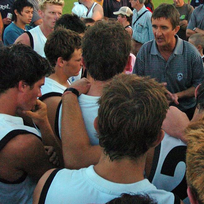 Southport Sharks versus Morningside in the AFL grand final in Brisbane. The dejected Sharks with coach Norm Dare.