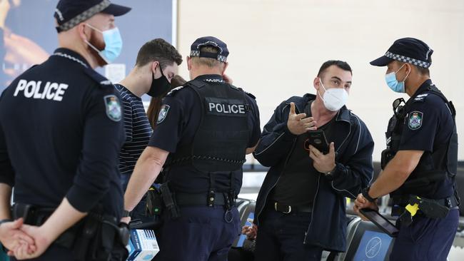 Gold Coast Airport welcoming the first passengers from Sydney into Queensland after the state border reopened. Picture Glenn Hampson.