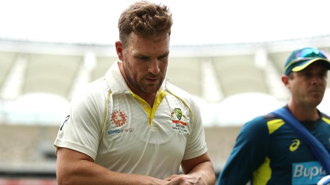 Aaron Finch was forced from the field on day three. Picture: Getty