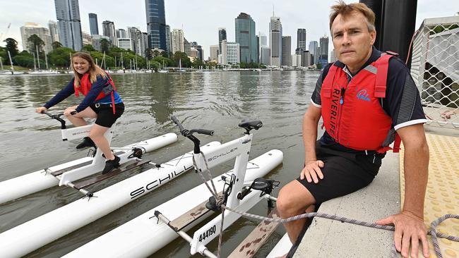 Hopeful: Adventure tourism pioneer John Sharpe, with supervisor Jacinta Yann, at their business on the river in the Brisbane CBD. Picture: Lyndon Mechielsen