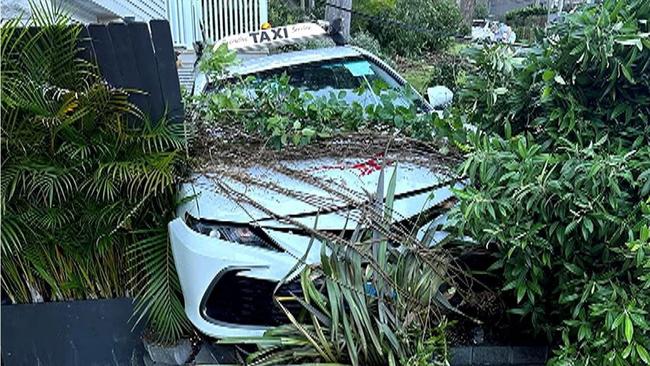 A taxi that crashed through three front gardens in Bayview Cl, Bayview, on March 10, 2024, after a driver, Harpeet Singh Sandhu, 26, of Dee Why, who blew 0.169, lost control of the vehicle after drinking with friends. Picture: 9News