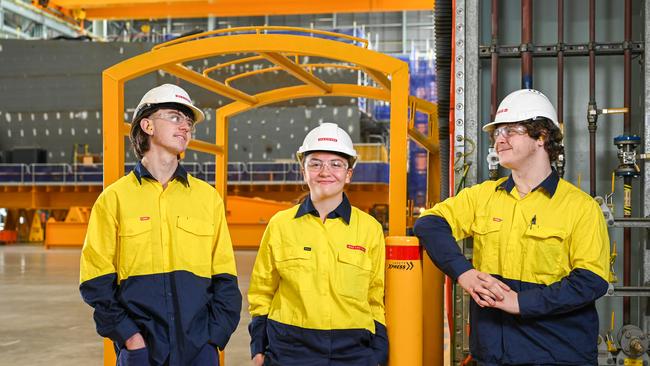 BAE apprentices Darcy Conry, 18, Rebecca Hlinak, 18 and Damon Anderson, 19 with part of the shipbuilding project in Osborne They are working on the Hunter Class Frigate program. Picture: Naomi Jellicoe