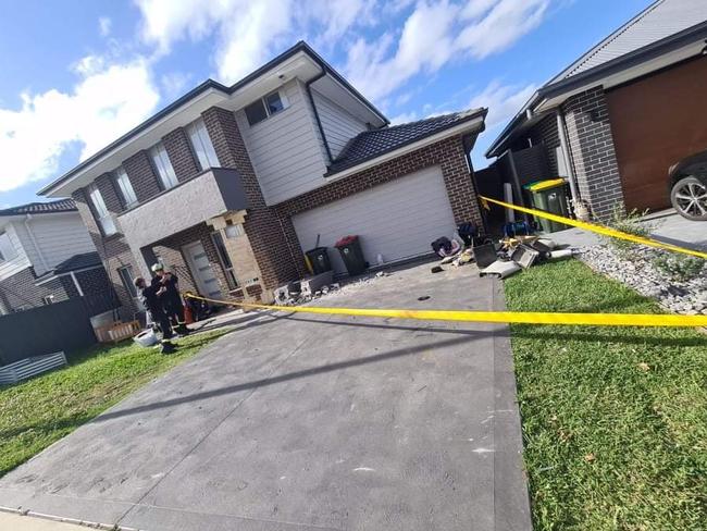 Emergency services outside the home on Sunday.