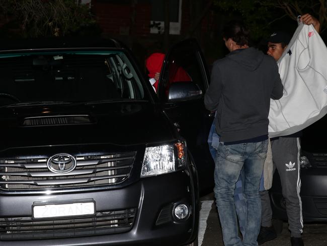 The couple leave the station in Stopar’s black ute. Picture: Bill Hearne