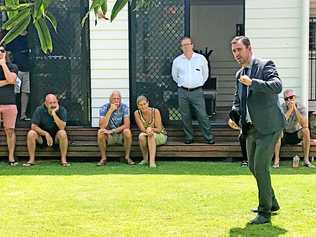 James Bell calls the bidding at 111 Parker St in Maroochydore on Saturday. Picture: Sally Waghorn