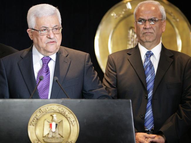 Palestinian leader Mahmud Abbas (left) delivers a speech alongside his negotiator, the late Saeb Erakat. Picture: AFP