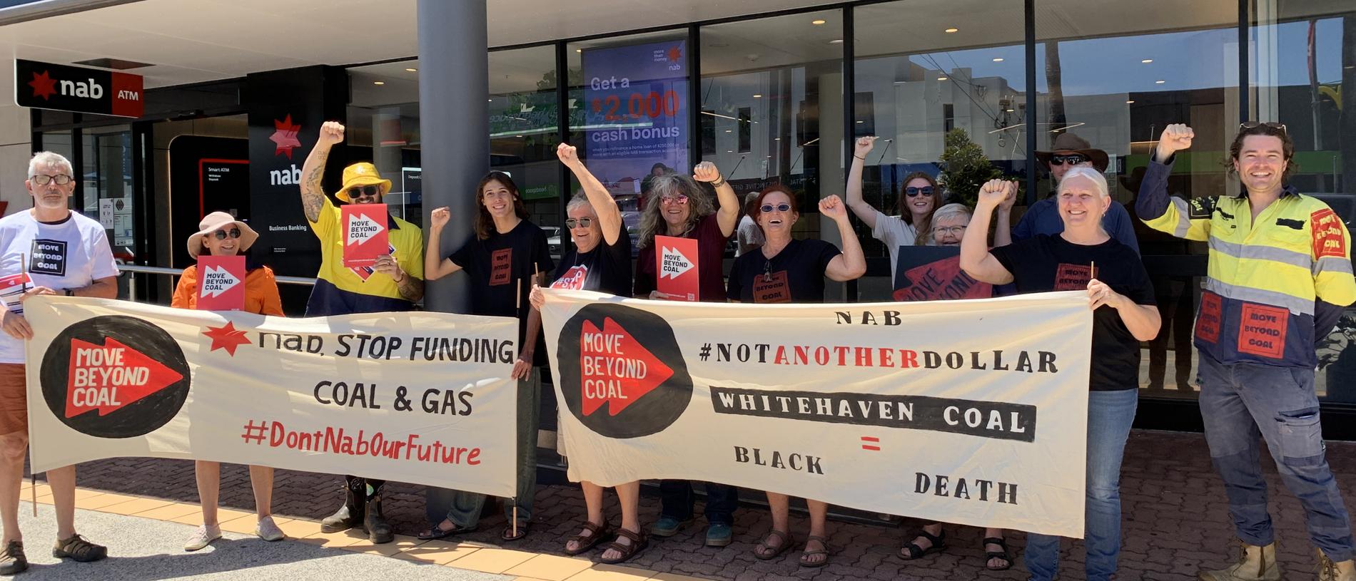 Move Beyond Coal protesters gathered outside the NAB branch on Victoria St in Mackay on November 11 to protest the bank's alleged support for Whitehaven Coal and other coal producers. Picture: Duncan Evans