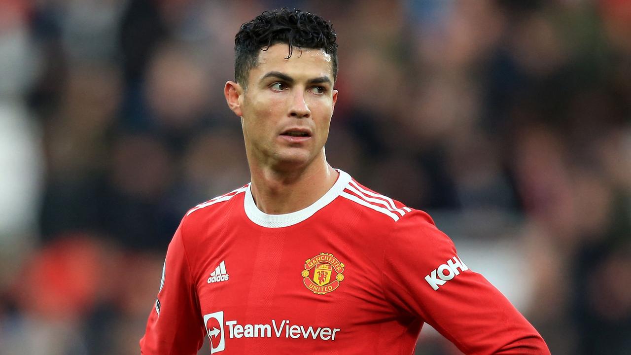 Manchester United's Portuguese striker Cristiano Ronaldo reacts after the final whistle of the English Premier League football match between Manchester United and Watford at Old Trafford in Manchester, north west England, on February 26, 2022. (Photo by Lindsey Parnaby / AFP) / RESTRICTED TO EDITORIAL USE. No use with unauthorised audio, video, data, fixture lists, club/league logos or 'live' services. Online in-match use limited to 120 images. An additional 40 images may be used in extra time. No video emulation. Social media in-match use limited to 120 images. An additional 40 images may be used in extra time. No use in betting publications, games or single club/league/player publications. /