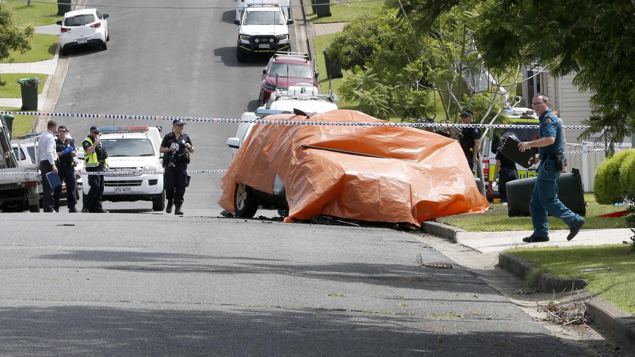 Police at the scene of a fatal car fire in Camp Hill. Picture: Steve Pohlner