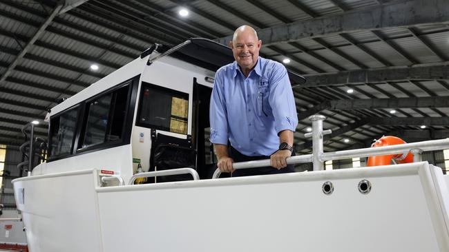 Tropical Reef Shipyard have built 7 Army Safety Watercraft vessels at their Portsmith workshop under a defence force contract. Tropical Reef Shipyard business development manager Andrew Wagner on one of the new boats. Picture: Brendan Radke