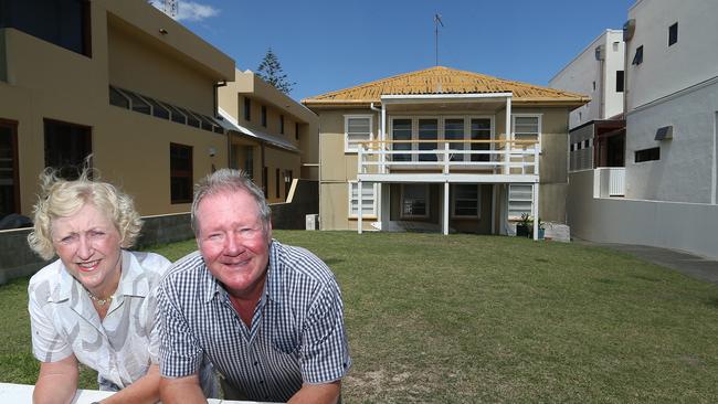 The beach shack at 151 Hedges Ave Mermaid Beach is finally on the market. Owner Cynthia O'Reilly and partner Bob Hodson with the property. Picture Glenn Hampson