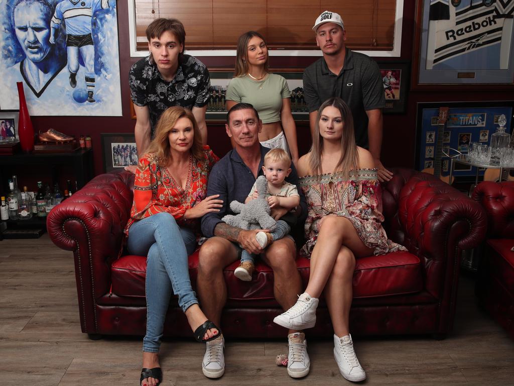 Mat Rogers and his family at his Clear Island Waters Home. Left to right they are, Max Rogers 16,Chloe Maxwell ,Mat Rogers, Phoenix Rogers 15, Ryda 1, Skyla Rogers 22, Jack Rogers 26. Picture: Glenn Hampson