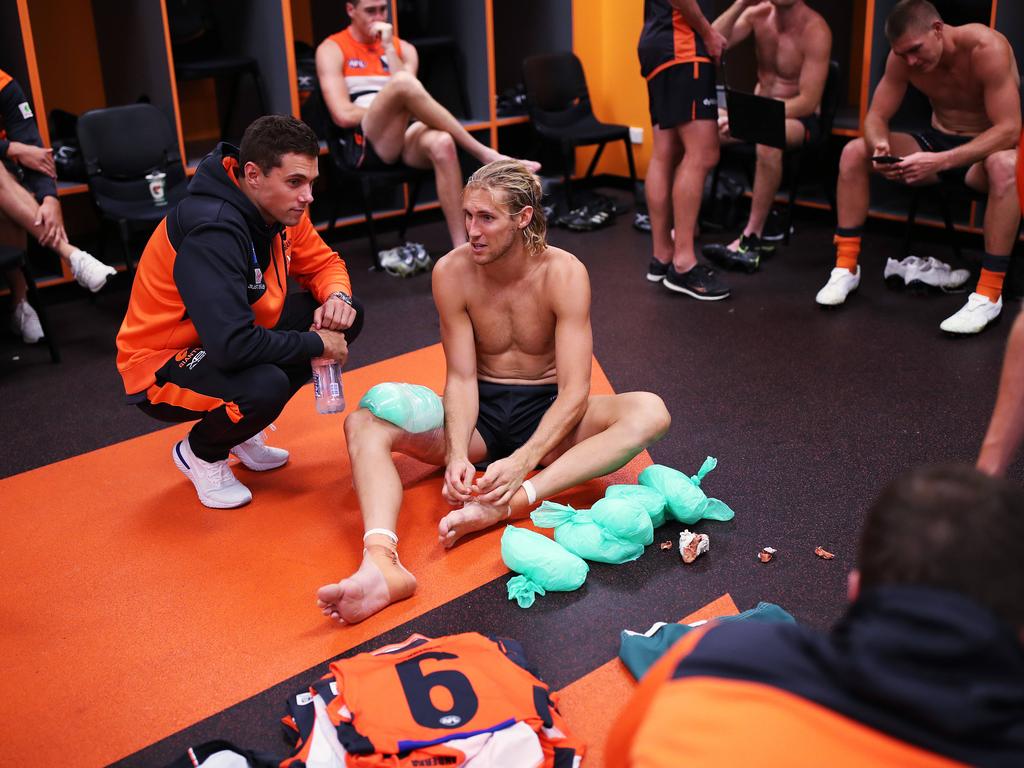 Josh Kelly talks with Nick Haynes who needed plenty of ice post game. Picture: Phil Hillyard