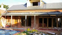 How a house was left by a builder, mid way through a project. Picture: Supplied.