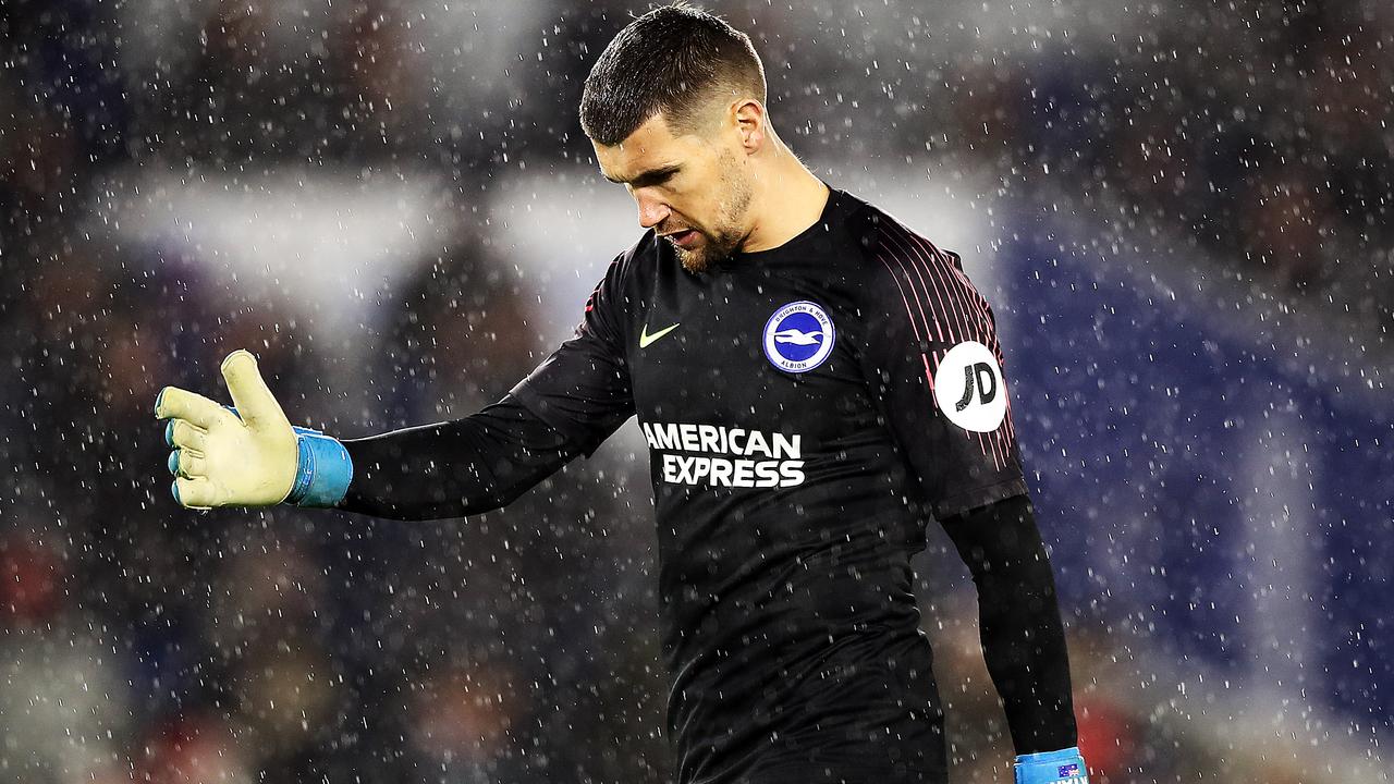 Mathew Ryan of Brighton &amp; Hove Albion looks on dejected following the defeat