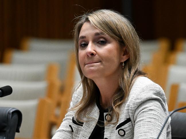 Optus CEO Kelly Bayer Rosmarin speaks during an inquiry into a national outage of the Optus network at Parliament House in Canberra, Friday, November 17, 2023. The November 8 outage left more than 10 million Australian individuals and businesses unable to make calls, access the internet or complete transactions for 12-hours. (AAP Image/Lukas Coch) NO ARCHIVING