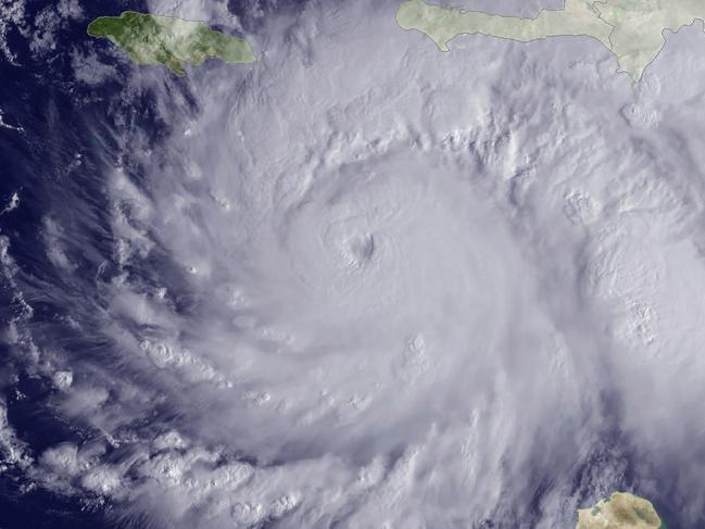 The GOES East satellite image shows Hurricane Matthew, currently located about 220 miles southeast of Kingston, Jamaica, at 1315 UTC on October 3, 2016. Hurricane Matthew has left one person dead and another missing in Haiti, officials said Monday, as it churns through the Caribbean as the worst storm in nearly a decade. As Haiti, Jamaica and other Caribbean nations gird for the Category 4 hurricane, Haitian authorities declared a halt to all maritime activities Saturday afternoon.Forecasters say Matthew is the most powerful storm in the Caribbean since Hurricane Felix in 2007.The US National Hurricane Center has forecast storm surges of up to three meters (10 feet) off Haiti's southern coast / AFP PHOTO / NOAA / HO / RESTRICTED TO EDITORIAL USE - MANDATORY CREDIT "AFP PHOTO / NOAA-NASA GOES PROJECT" - NO MARKETING NO ADVERTISING CAMPAIGNS - DISTRIBUTED AS A SERVICE TO CLIENTS