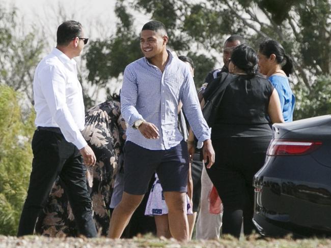 Fainu was greeted by family members when he was earlier released from Parklea Correctional Centre on bail.