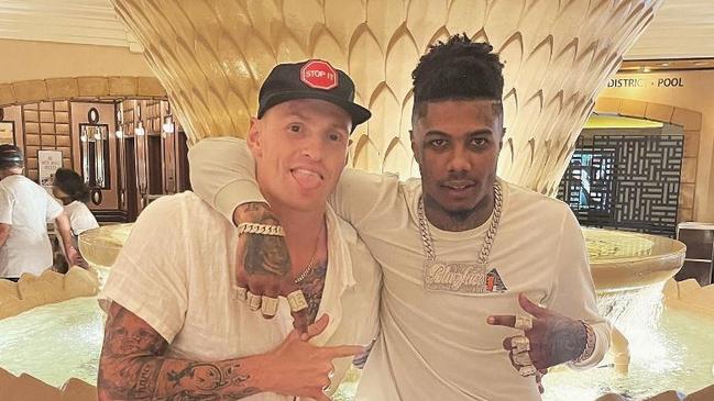 Former Brisbane Lions star with Rapper Blueface. Mitch Robinson documents his trip to the United States with his ex-teammates in October. Source: Mitch Robinson