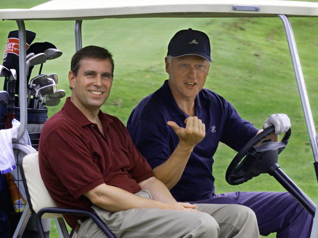 Prince Andrew was pictured playing golf in Spain. This photo from 1999 shows the Prince golfing with former US President Bill Clinton. Picture: Supplied