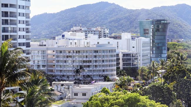 The Double Tree Hilton hotel on the Cairns Esplanade (centre), where a stolen helicopter on an unauthorised flight crash landed at about 1:50am Monday, killing the pilot. Picture: Brendan Radke