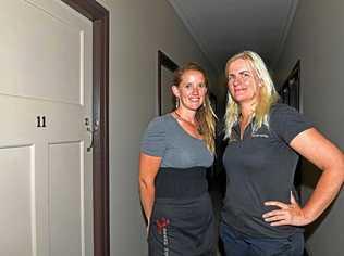 Emma Lucas and Sally Detlefson outside Room 11 of Joe's Grand Hotel in Goomeri. Picture: Troy Jegers