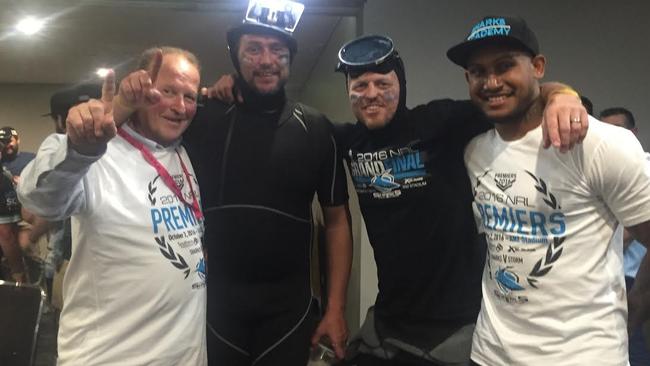 Buzz celebrating with Ben Barba, right, with Sharks fans at the 2016 grand final afterparty.