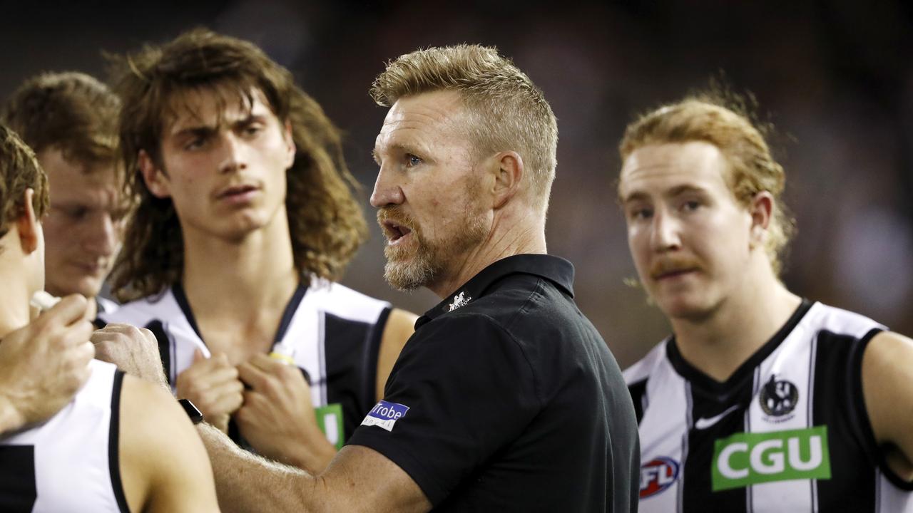 MELBOURNE, AUSTRALIA - MAY 08: Senior Coach Nathan Buckley of the Magpies addresses his players during the 2021 AFL Round 08 match between the North Melbourne Kangaroos and the Collingwood Magpies at Marvel Stadium on May 08, 2021 in Melbourne, Australia. (Photo by Dylan Burns/AFL Photos via Getty Images)