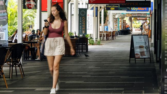 A tourist walks along the quiet Esplanade Dining Precinct near Cairns Night Markets on Tuesday afternoon. Picture: Brendan Radke