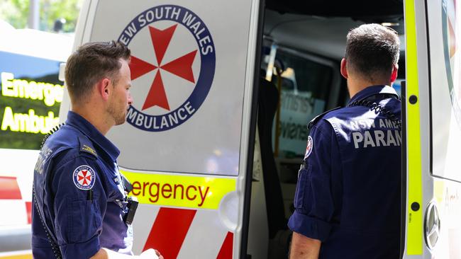 Paramedics tried to revive a motorcyclist at the scene of serious crash on the Pacific Highway but despite their best efforts, he died of his injuries. Picture: NCA Newswire / Gaye Gerard