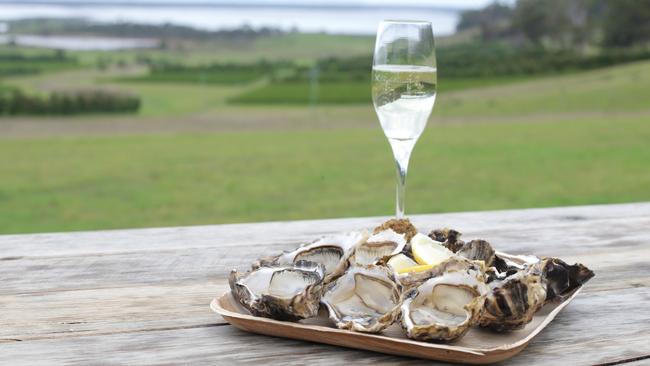 TAS WEEKEND: EAST COAST WINE TRIP: ***Dining Guide** Freycient Marine Farm Oysters served with a glass of Devil's Corner sparkling PICTURE: LUKE BOWDEN