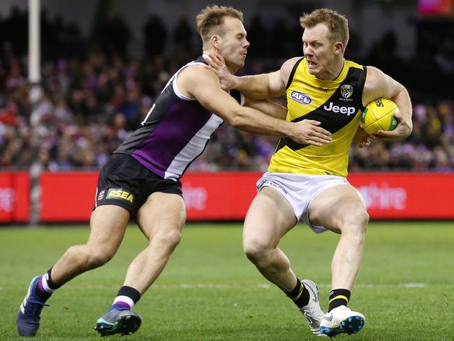 Bailey Rice tackles Richmond’s Jack Riewoldt. Pic: Michael Klein