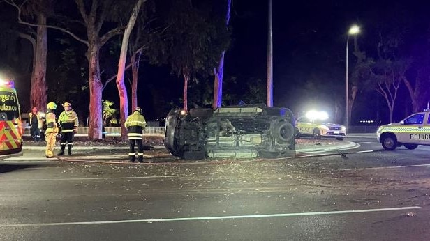 A man is lucky to be alive after he lost control of his car at the Britannia Roundabout. Picture: SA Police