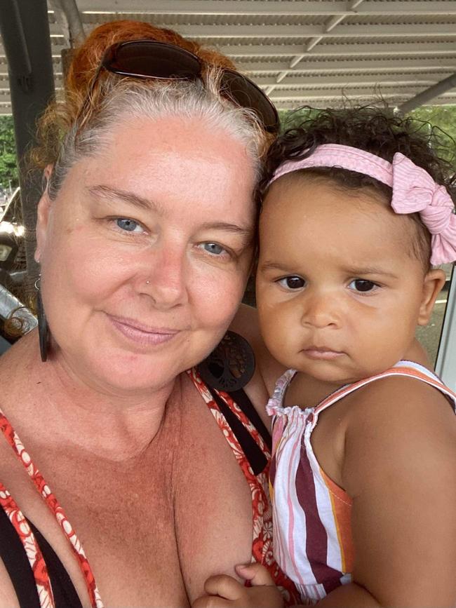 Penny Fenner and her two-year-old daughter Mahlia were rescued by surf life savers as rapidly rising flood water entered their Holloways Beach home as the Barron River flooded on Sunday. Picture" Supplied.