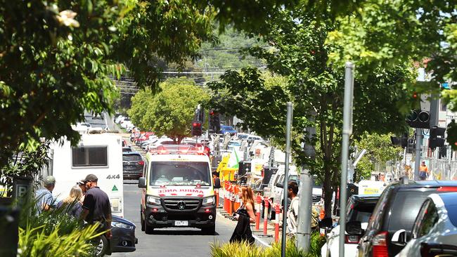 An ambulance with lights and sirens forced onto the wrong side of the road during works on the Green Spine in Malop St Geelong. Picture: Alison Wynd